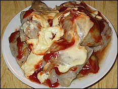 Stuffed cabbage rolls with vegetables.