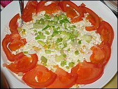 Chicken Salad with carrot and green peas.