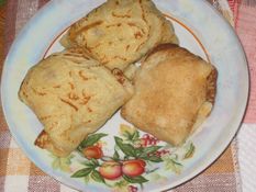 Blini filled with meat - pancakes