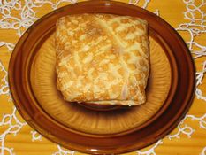 Blini filled with pot cheese. Pancakes are very tasty and healthy.