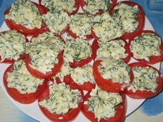 Tomatoes stuffed with cheese.